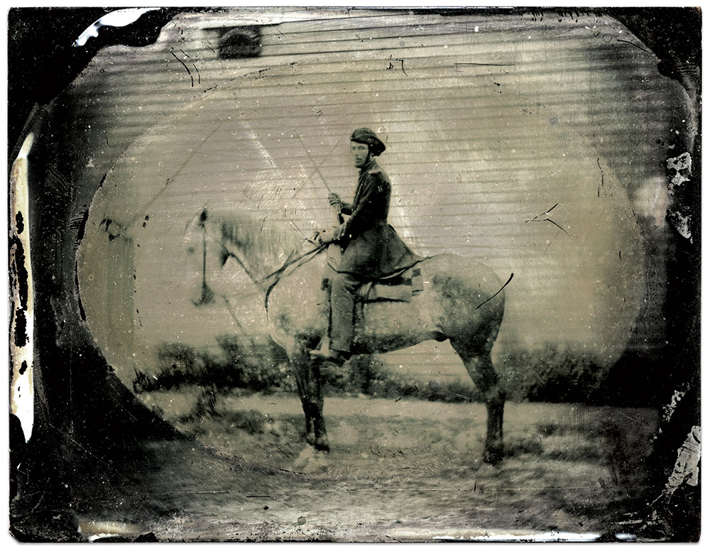 Pvt. James Lawrence Secrest, Jeff Davis Legion of Cavalry, pictured with Sela. Quarter-plate ruby ambrotype by an unidentified photographer. Rick Brown Collection of American Photography.