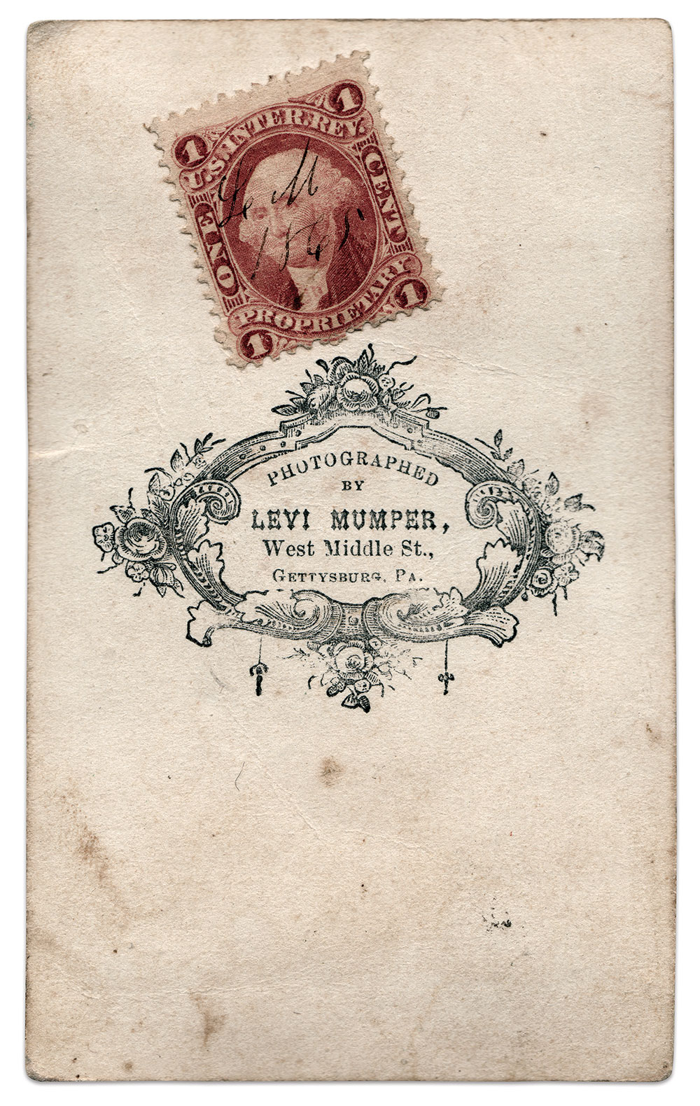 Mumper's imprint, and a tax stamp hand-cancelled with his initials and 1865 date on the back of the carte de visite mount. Author’s Collection.