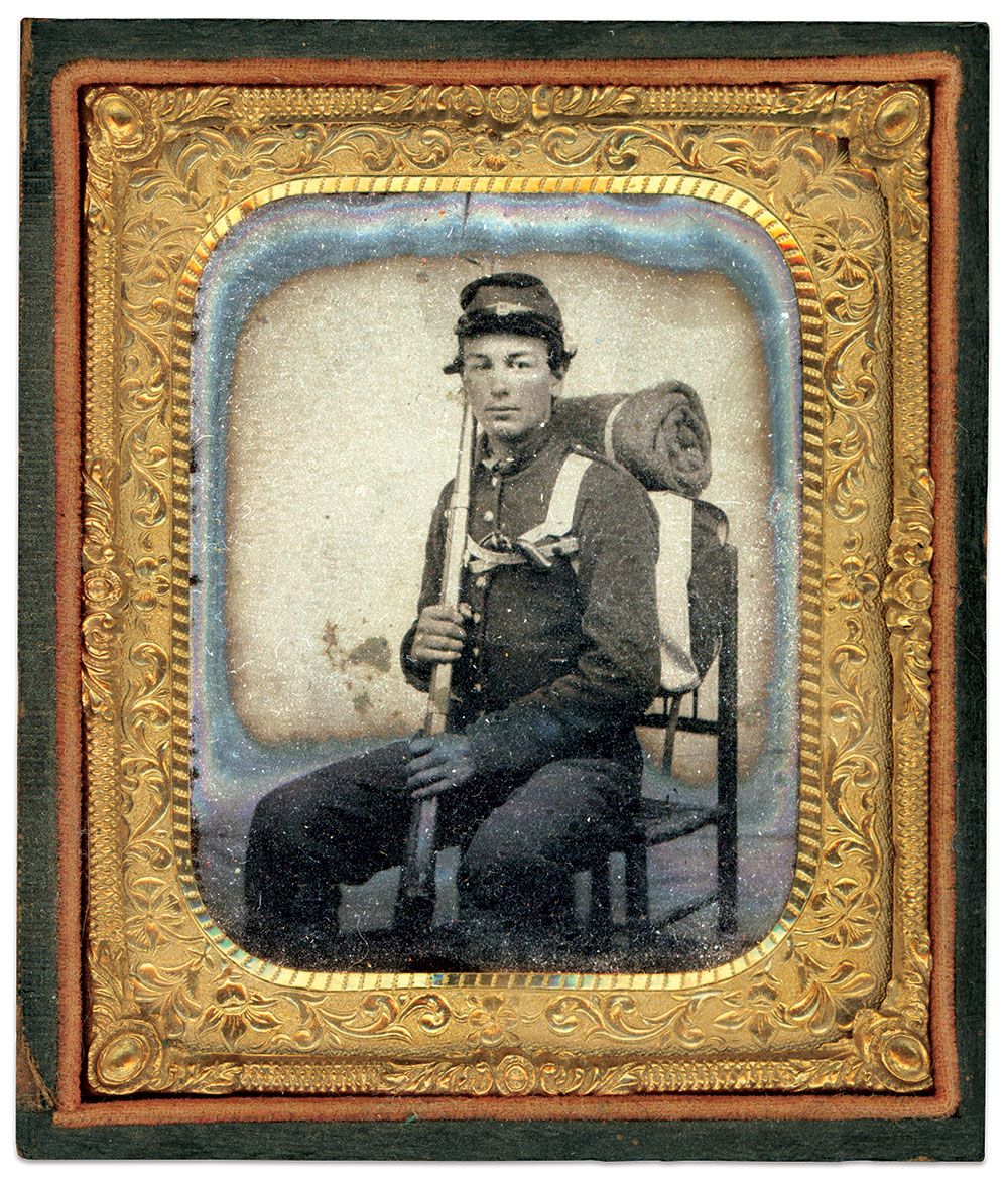 Early war photograph of federal soldier with Gray knapsack. Sixth plate tintype by an unidentified photographer. C. Paul Loane Collection.
