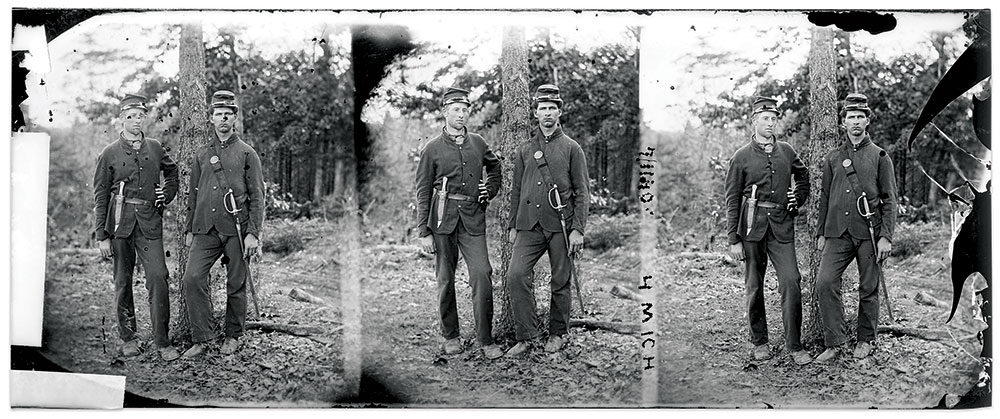 Figure 3: Two soldiers beside a tree. Positive reproduction of glass negative (NARA 111-B-5527). National Archives.