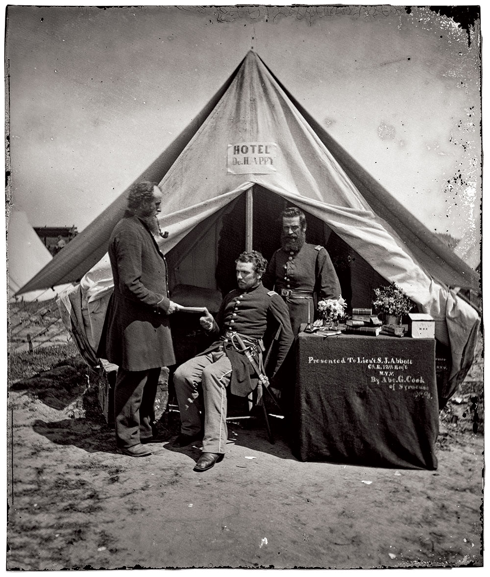 This tableau featuring 2nd Lt. Samuel Abbott, seated in the center, may have been taken on Capitol Hill in May 1861 after he joined the 12th New York Infantry, or in nearby Arlington, Va., in August 1861 after he advanced to first lieutenant. Glass plate collodion negative by Mathew B. Brady of New York City and Washington, D.C. National Portrait Gallery, Smithsonian Institution; Frederick Hill Meserve Collection.
