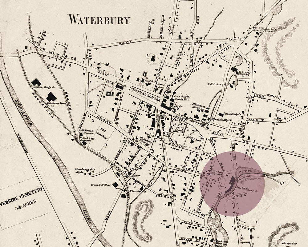 An 1856 map of Waterbury locates the Scovill Manufacturing Company along the Mad River. The complex of buildings connects to downtown via Scovill Street.