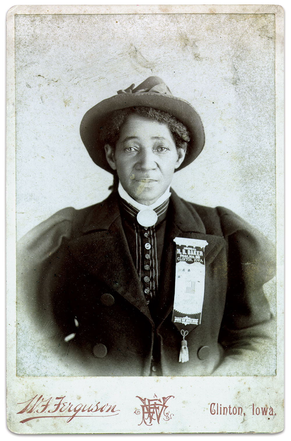 Elizabeth Fairfax wore a silk badge for the General N.B. Baker Post of the Grand Army of the Republic organized in Clinton, Iowa, for her cabinet card photograph by William Frazer Ferguson, a native of Scotland. Author’s collection.