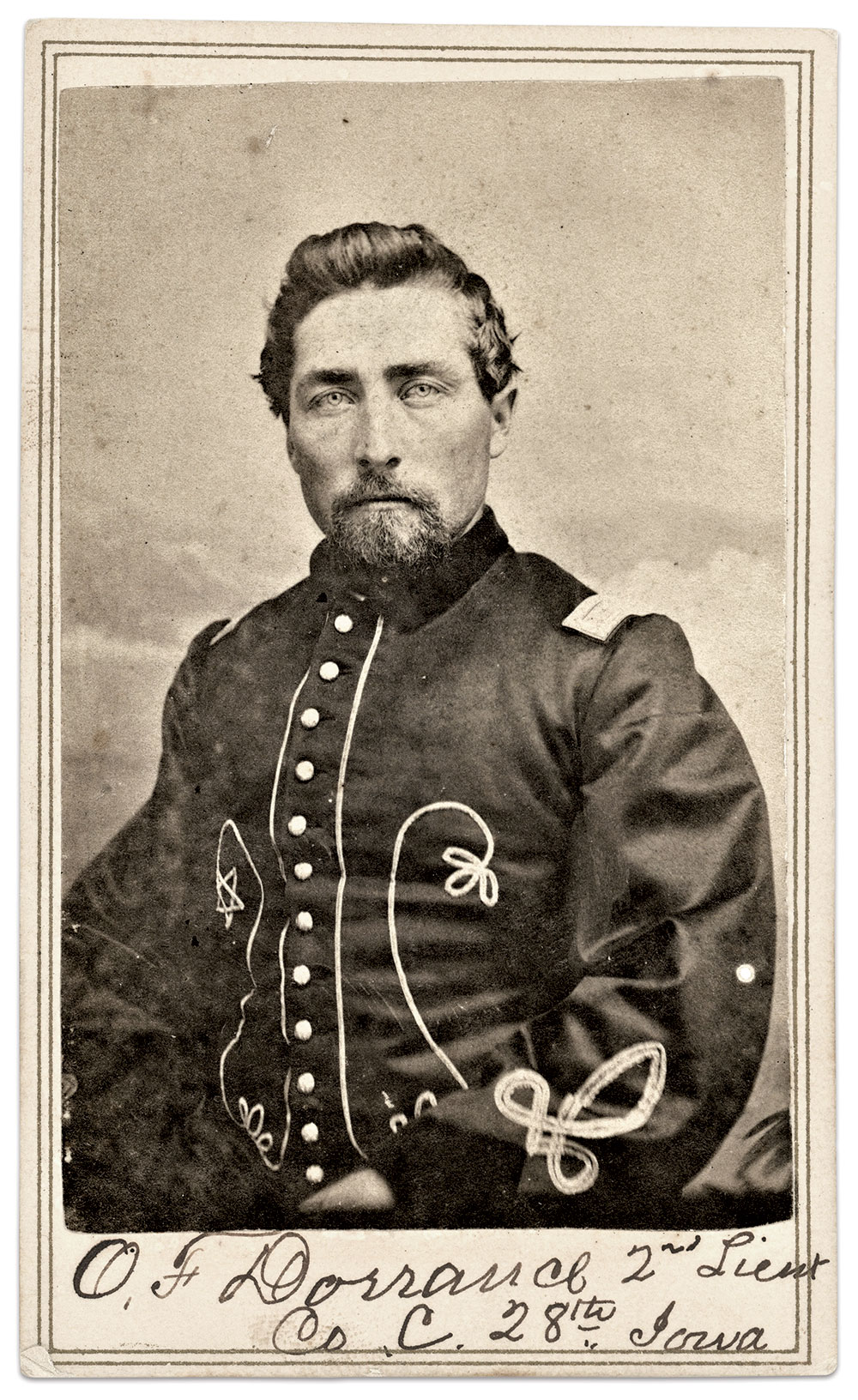 The jacket worn by 2nd Lt. Orange Fuller Dorrance (1838-1924) of Company C features a variant star design and a tombeau in place of the shield. The looping along the bottom is larger and closer to the front. Carte de visite by J.A. Sheldon of New Orleans, La. Mark Warren Collection.
