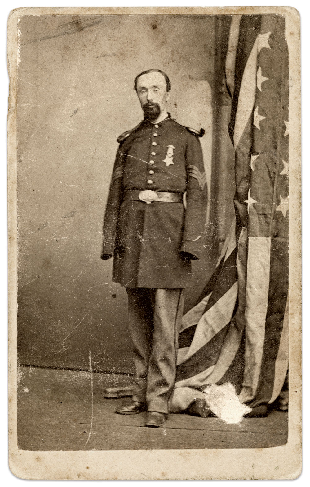 THE HERO, THE MEDAL: Plunkett wearing his Medal of Honor, circa 1866. Carte de visite by Albin Yeaw and Merchant H. Lufkin of Lawrence, Mass.