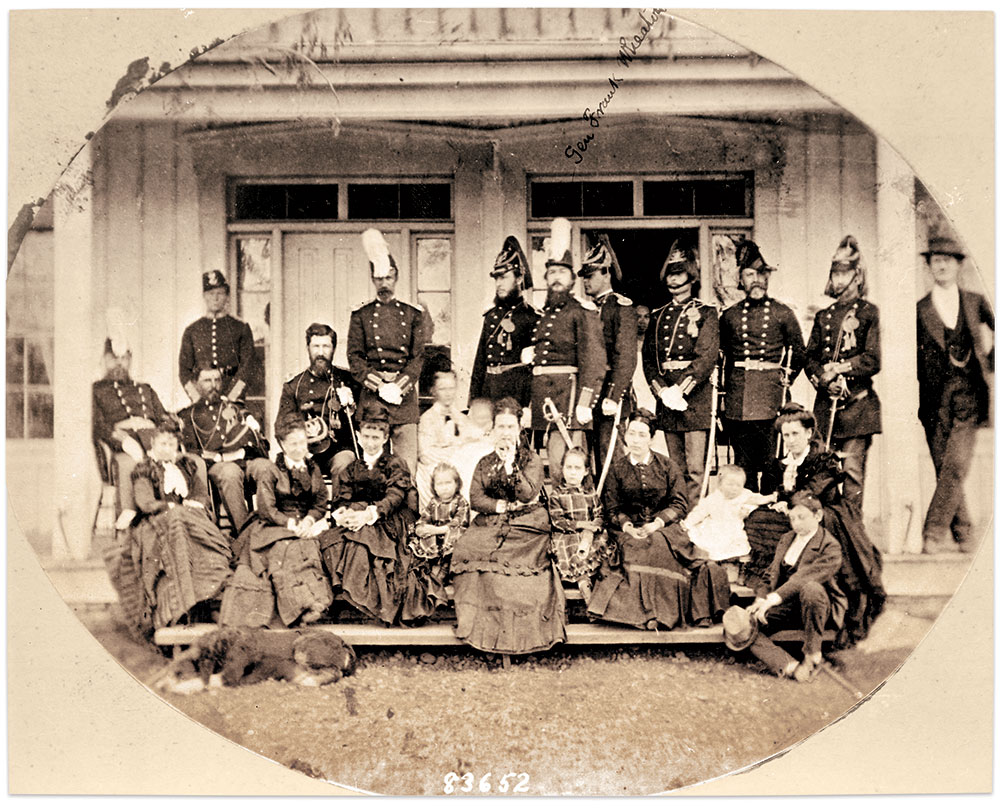 Wheaton, center, with white-plumed hat staring at the camera, and officers with their families at Fort Walla Walla, Washington Territory, in 1874. National Archives.