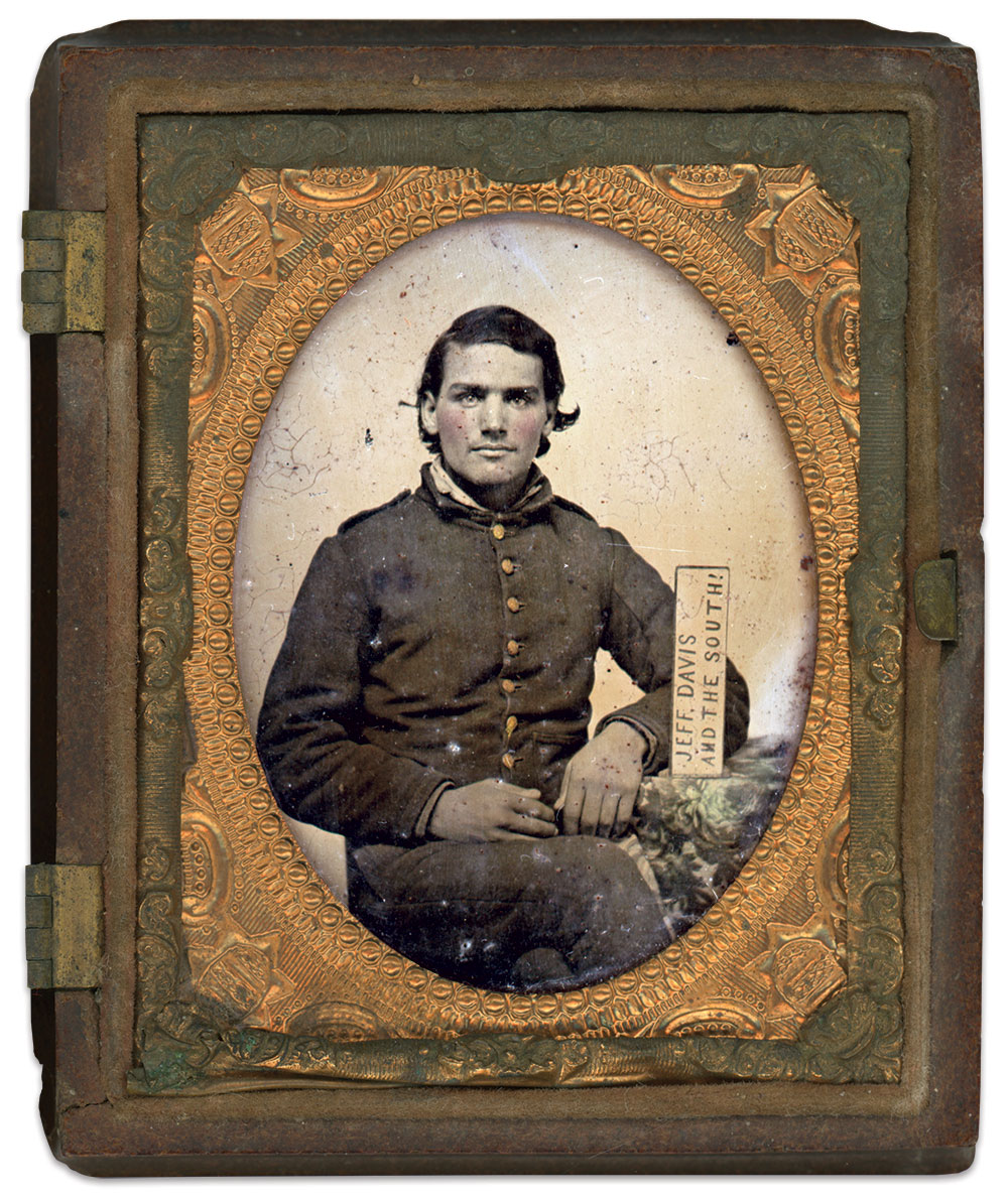 Unidentified soldier: The N on the placard is not the only reversed item.Note the buttons on his coat, which opens on the left instead of the right. Ninth plate ambrotype. Paul Reeder Collection.