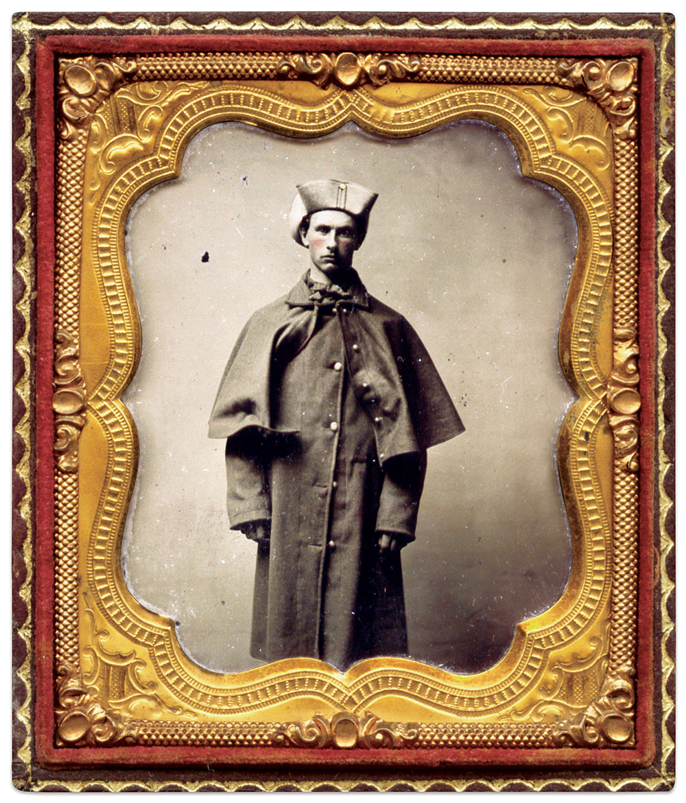 Photographed on a cold New England spring day in 1861, this volunteer belonging to the 4th M.V.M. wears his hat with his gray state-issue, single-breasted infantry overcoat. Sixth-plate ambrotype by Benson C. Hazleton of Boston, Mass. Author’s collection.