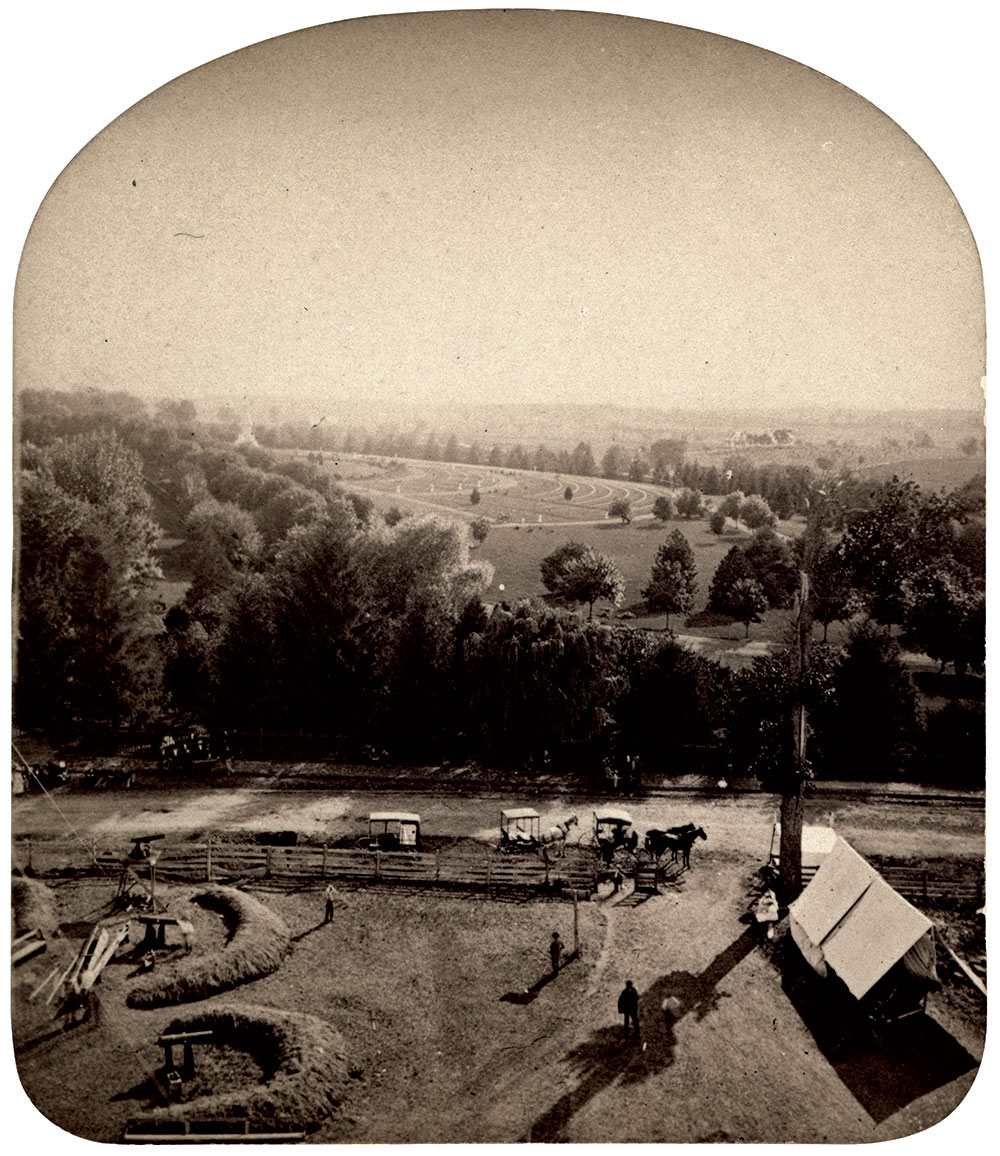 View of the Soldiers’ National Cemetery from a battlefield observatory. This stereo card is No. 736 in W.H. Tipton & Co.’s “Stereo Gems of Gettysburg Scenery” series.
