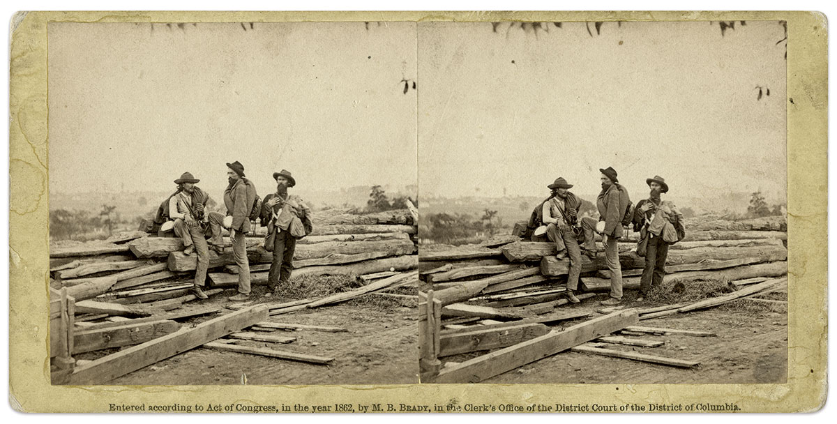 AUGUST 1863: Lucius Fairchild, above, purchased Brady’s 14-card set of Gettysburg stereo cards in the summer of 1863. His original of the prisoners is pictured here on the pale yellow mount inexplicably copyrighted 1862, a year before the battle. Fairchild led the 2nd Wisconsin Infantry at Gettysburg and suffered a wound that cost him his arm. Wisconsin Historical Society.