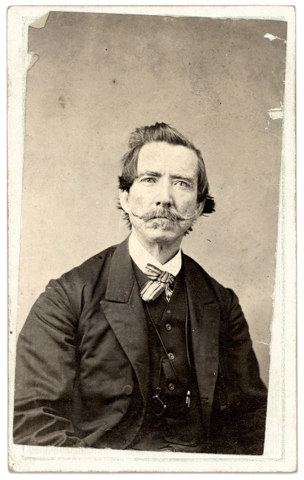 In the portrait picturing an older Semmes, his hair remains full and dark, but his unkempt mustache and doleful eyes confirm the fatigue of an eventful life. This image was found in a family album in 2021. Carte de visite by an unidentified photographer. Author’s collection. 
