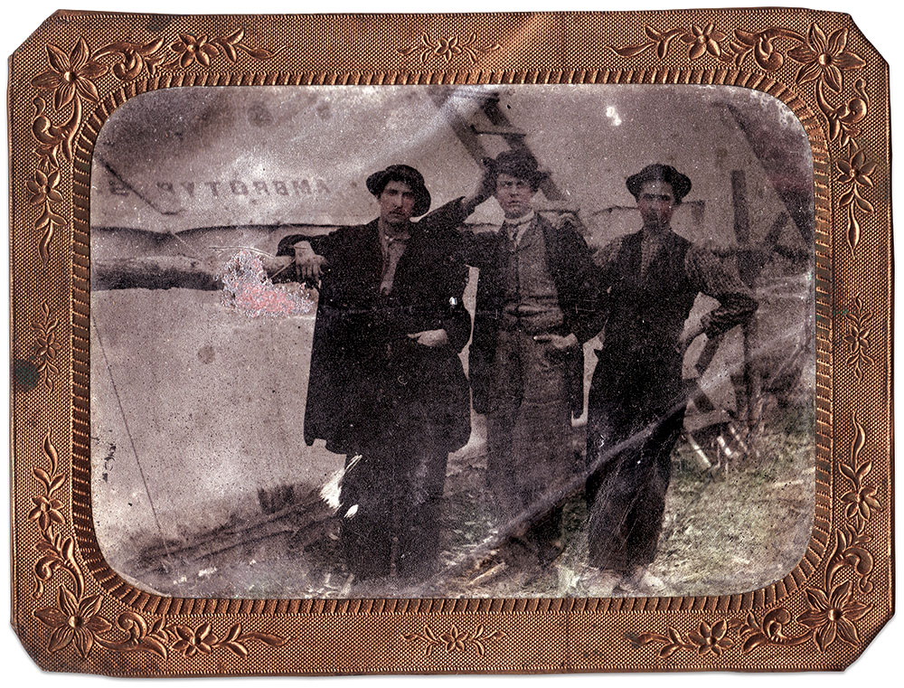 Three men, perhaps assistants to Kunstman during his time as official photographer for the Army of the Potomac’s 11th Corps, 1st Division, pose in front of a tent marked “Ambrotype.” Eighth-plate tintype. Kyle L. Miller Collection.