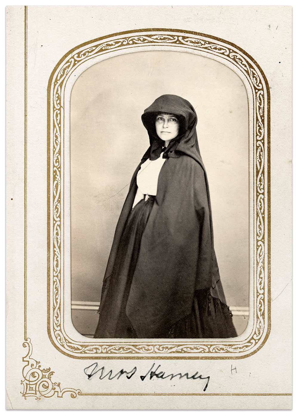 Cordelia Harvey, shown in her signature black-hooded cape, the only known photograph of her in existence. Carte de visite by an unidentified photographer. Wisconsin Historical Society Collections.