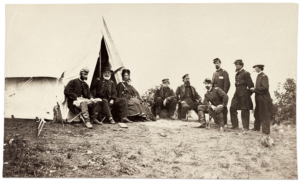 Kate pictured with Brig. Gen. John J. Abercrombie (1798-1877), West Point 1822, and other officers, circa 1863-1864. Albumen print by an unidentified photographer. Library of Congress.