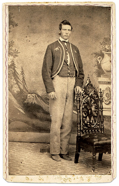 This full-length pose of Andrew J. “Andy” Lynch of Company K provides an optimal view of the jacket, separate vest, and plain sky-blue infantry trousers of the regiment’s enlisted men. Lynch (about 1846-1895) served from April to July 1865. Carte de visite by Apple and Thorn of Indianapolis, Ind. Steven Karnes Collection.