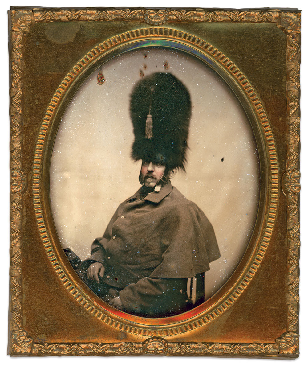 Lieutenant Moses S. Herrick of the 8th Massachusetts Infantry, pictured in greatcoat and bearskin hat, suffered a serious wound inside the Capitol Rotunda. Quarter-plate ambrotype by an unidentified photographer. Author’s collection.